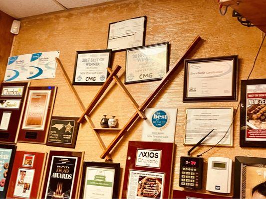 All of the Awards on the wall.