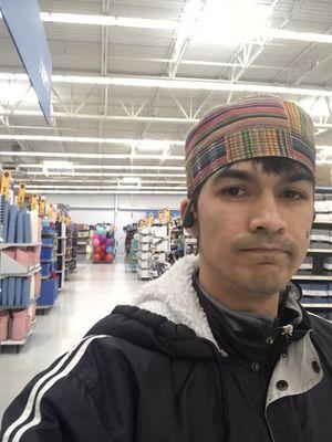 notice this guy coughing and following me around the store who works for walmart after taking his picture he stopped following me