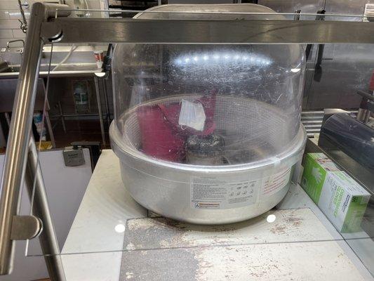 My son wanted cotton candy  I guess we're not having any. How disgusting and yes that is a used mask inside the Machine