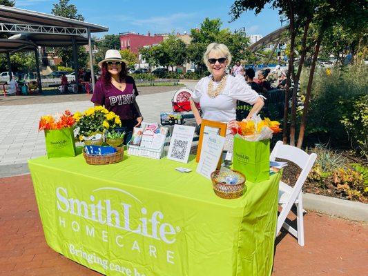 Erika Chavez and Kathleen McGuinness of SmithLife Homecare presenting senior in home care services in Washington, DC