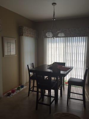 Sheers and cornices in eating area