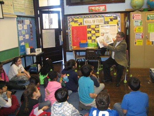 Clay reading at Swift School