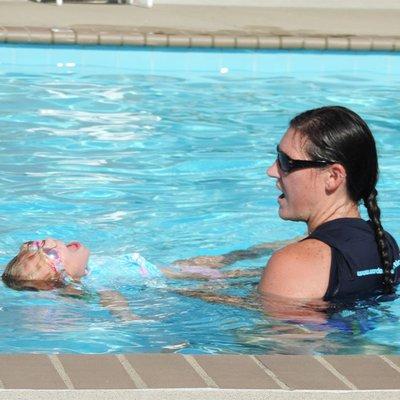 Instructor Rachael with a  swimmer at our summer location in Spring Hill, TN.