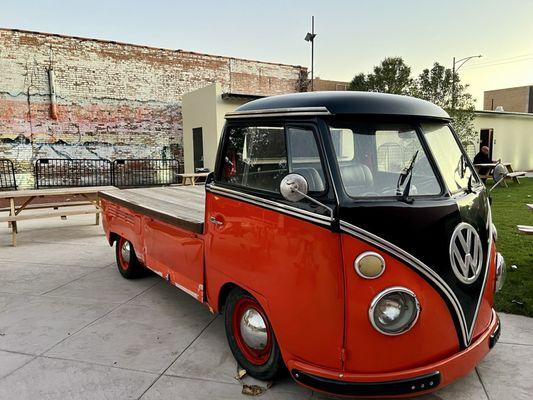 I imagine the bed of this old school van can be used for vendors or maybe even an outdoor performance!