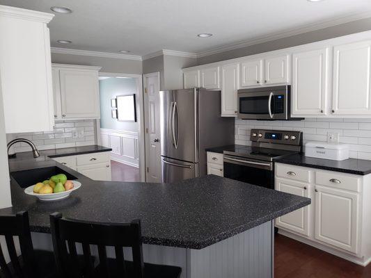 Beautiful Solid Surface Counter tops with White Cabinets