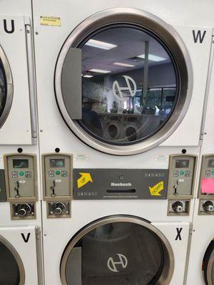 Dryers, 4 minutes for $.25  They also have letters on them to remember which dryer you are using.