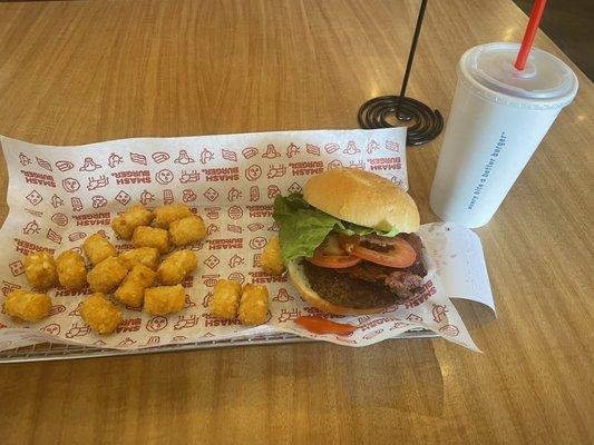 Single smash burger, regular tots, and a regular drink. One meal for more than $17.