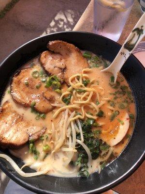 Spicy tonkutsu ramen with chasu, green onions and spinach.