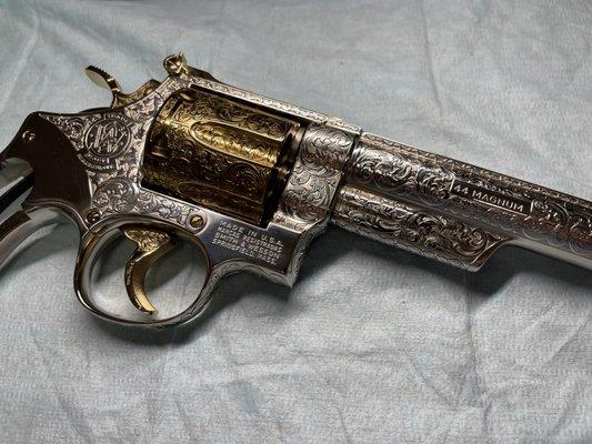 Custom laser engraved smith and Wesson 8 in revolver, nickel plating and 24k gold plating