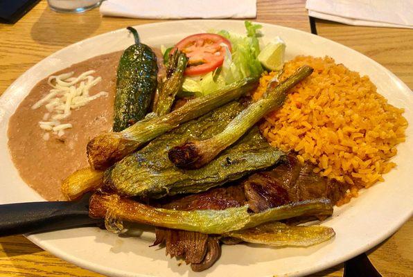 Arrachera Asada. A thin pounded skirt steak that . . . I don't know how they did it with it being so thin, but was a perfect medium rare.