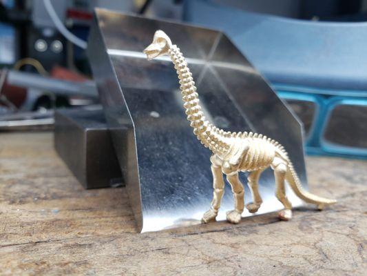 Toy dinosaur scanned and cast in gold!