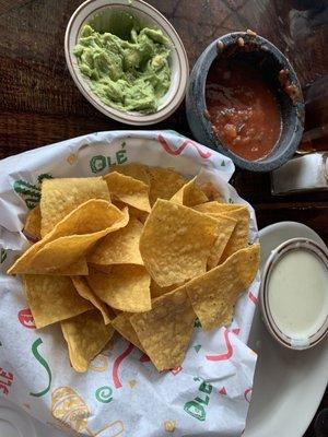 Chips, guacamole, salsa, queso dip