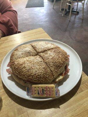 Muffuletta Supreme. It would easily feed 3 people!!!! Check out the cracker for comparison. Not only is it huge but it's so good!!!!!!