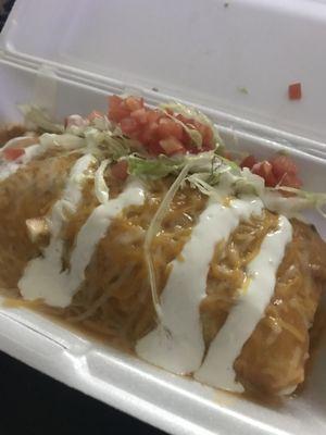 Smothered carnitas burrito, fully stuffed with unflavorful meat and unflavorful chili. It was very filling though.