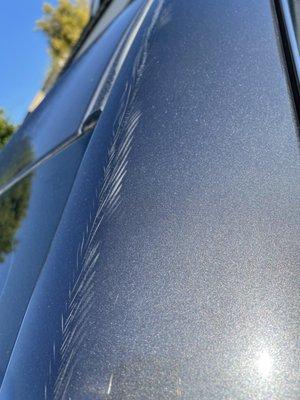 About 4 ft long is these scratch markings on top of edge of my car on passenger side.