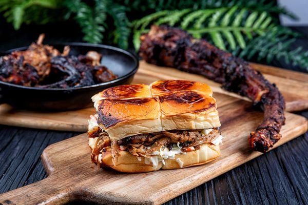 Mouthwatering braised and pulled oxtail meat, resting upon luxurious seasoned slaw. Sandwiched between soft sweet Hawaiian bread.