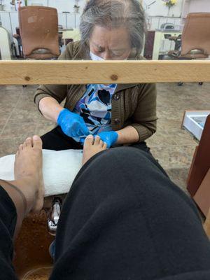 Loan doing pedicure