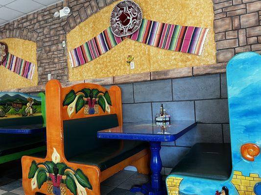 The ambience includes colorful palette and wonderful music, and kitchen staff who sing