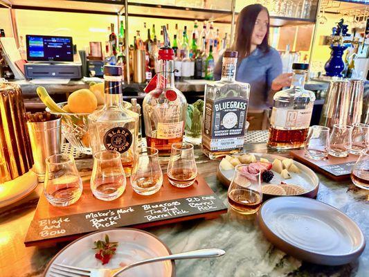 Bourbon tasting flight with included charcuterie.