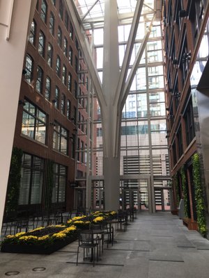 Street level atrium with neat falling water art work / sculpture