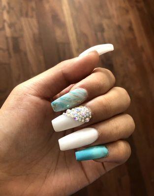 Acrylic nails with design and jewels