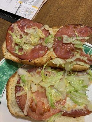 Sub, burnt bun, four slices of meat that you can see through and very little of anything else.