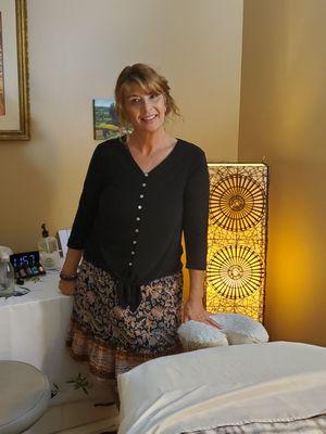 Kat Pisani in her healing therapy room. Massage Therapy is Life.