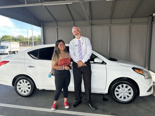 Richard and my daughter. This man right here made it as smooth as can be for her first time purchasing her first car! Thank you Richard!