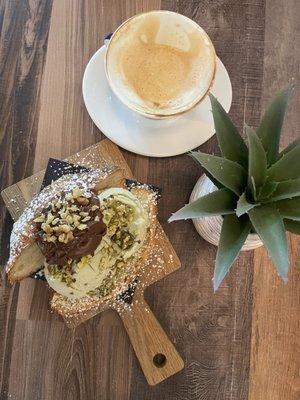 Croissant w/ Nutella and pistachio gelato along with an excellent cappuccino! Buon appetito!