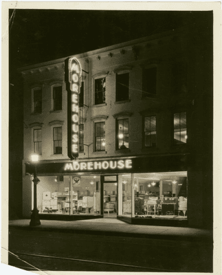 Night shot of newly remodeled store circa 1930s