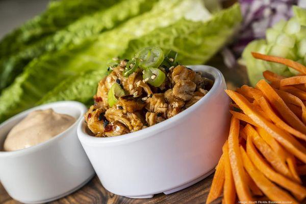 Chicken Lettuce wraps for the perfect casual restaurant experience. Pair it with our live music, four full bars, and amazing activities!