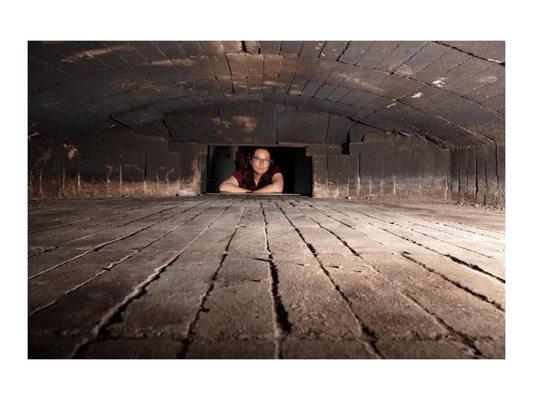 The Jamie looking into the 100 plus ton bread oven with 6x9 foot inside dimensions!! Not an easy photo to take! Zoom in!  lol