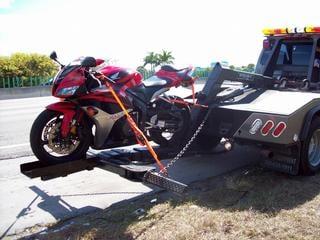 Motorcycle towing www.safaritowing.com your forst choice for towing in Collin county Frisco allen anna mckinney prosper plano