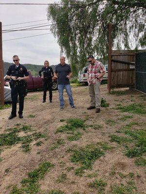 CURRUPT SR. BUILDING INSPECTOR JASON SIBLEY IN THE GREY SHIRT AND BLUE JEANS AT ONE OF HIS ILLEGAL PROPERTY INSPECTIONS.