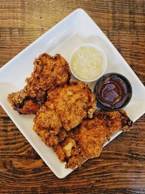 Chicken Tenders -- Fresh hand battered Chicken Tenders served with BBQ and Honey Mustard