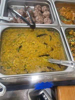 Steamed ragi balls Dal (bottom)