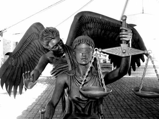 Angel of Mercy and Lady Justice.