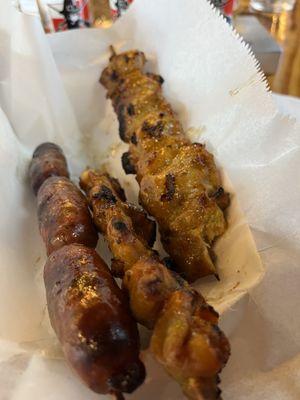 Chicken skewers and sausages, Theara