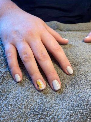 Natural nail with gel manicure and fun nail art.