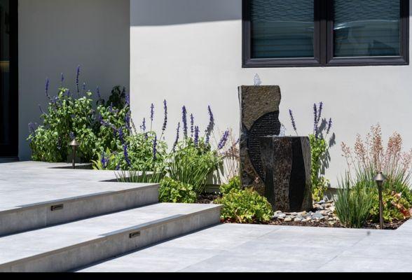 Travertine stairs with water feature