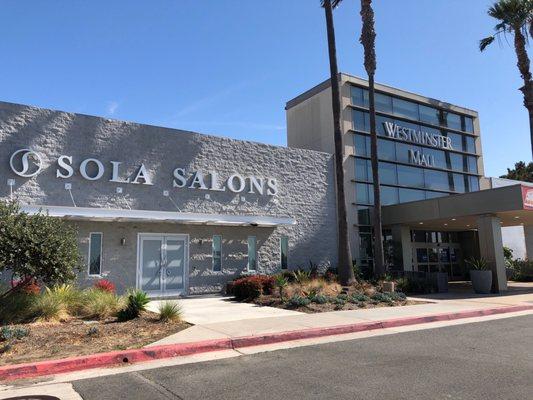 Park in lot with Sola Salons entrance