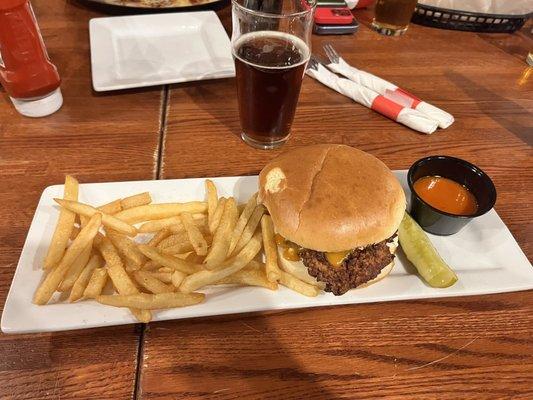 Spicy crispy chicken sandwich with a side of the melt my face hot sauce