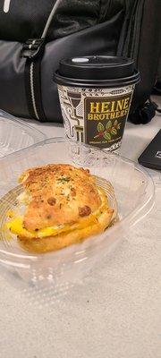 I guess I should taken the pic 1st then taken a bite :) Bacon, egg and cheddar biscuit with black coffee.