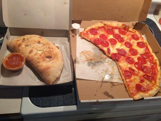 The calzone on the left is a small- still huge. The pizza is a large extra cheese with pepperoni. FANTASTIC!!!