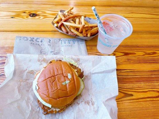 Fried chicken Boxcar sandwich with fries and cocktail from Spindle Bar (Flower Child)