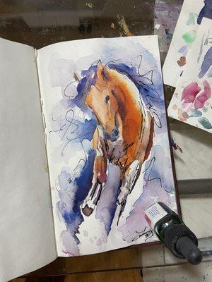 Capturing the power and grace of a horse in motion, brought to life with vibrant watercolors and expressive strokes