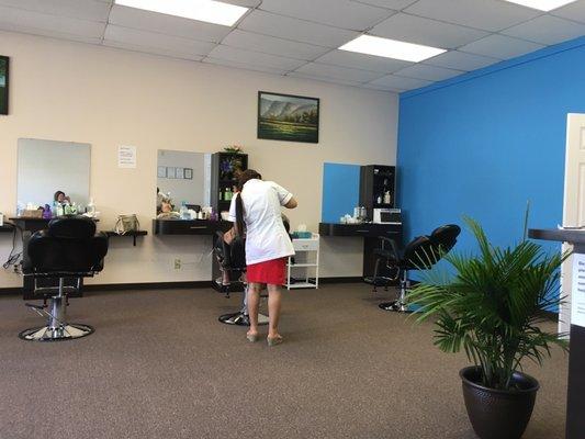 My mom getting her eyebrows threaded.