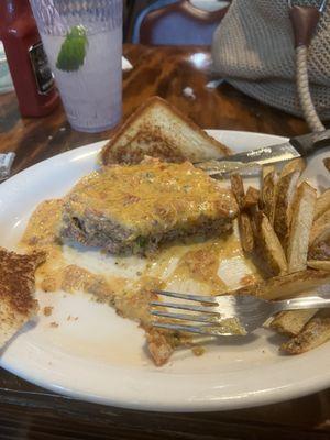 Stuffed pepper steak with queso and home fries- ( forgot to snap before I ate ) but it is a consistent go to!