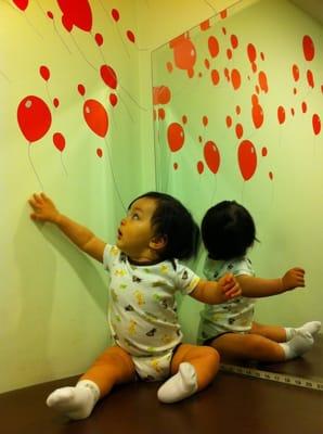 Flying red balloons, every baby's favorite!