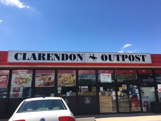 Front of the convenience store where the restaurant is located in the back.